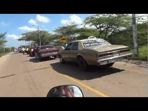 Slicing Through Traffic On A Motorcycle At The Colombia-Venezuela Border